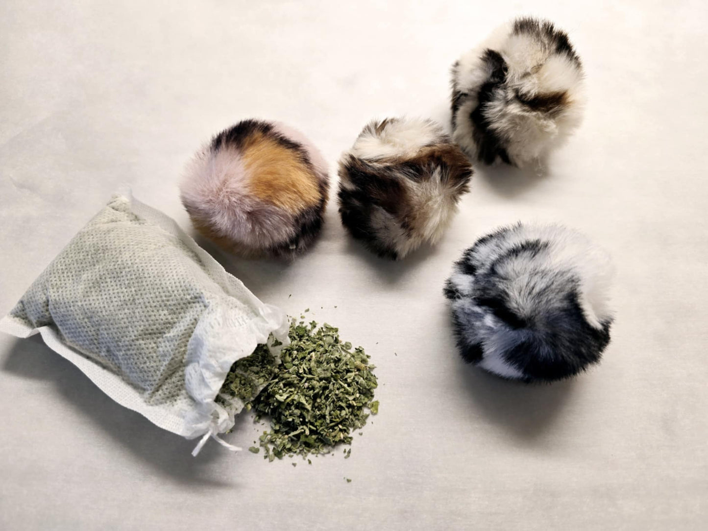 4 Pack of Faux Fur Balls PLUS a Bag of Our Premium California Catnip Included