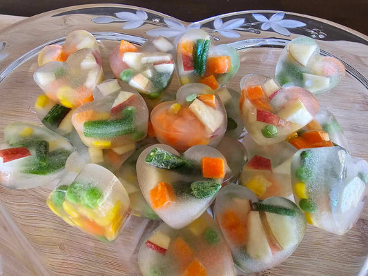 Homemade Healthy Frozen vegetable & Fruit heart-shaped dog treats.